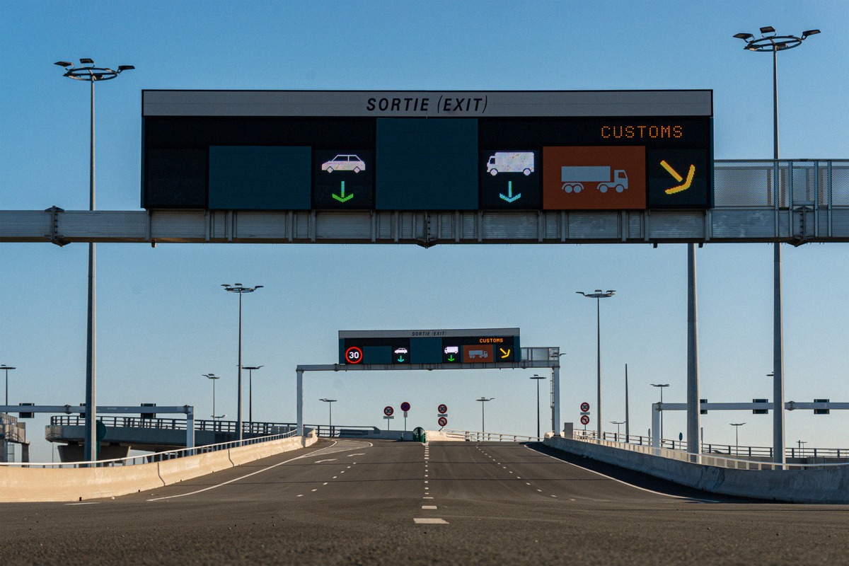 Signposted lanes for cars, motorhomes and lorries at the customs exit of Calais ferry port